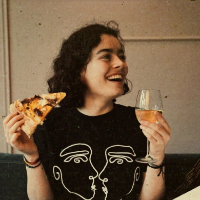girl eating vegan pizza